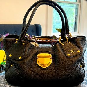 Prada Milan’s black pebbled leather handbag